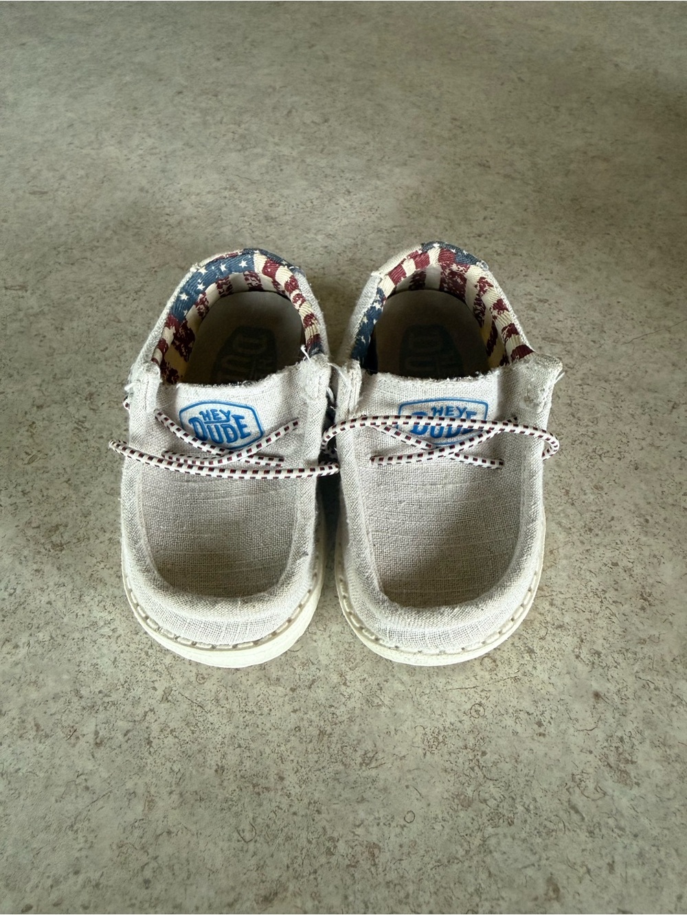 Hey Dude Kids Canvas Slip-Ons in Beige with Red & Blue Trim